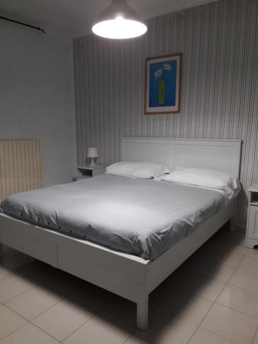 Katil atau katil-katil dalam bilik di B&B La Villa