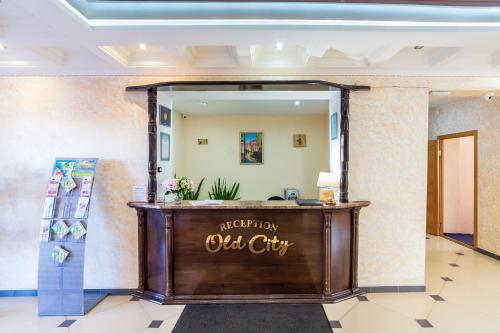 a lobby of a hotel with a reception desk at Old City in Pskov