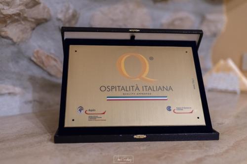 a laptop computer sitting on top of a table at Agriturismo Country Casale Rufo in Sonnino