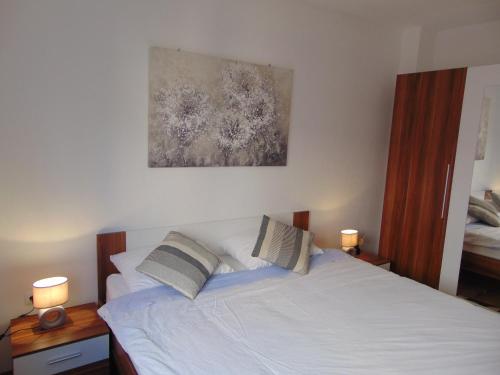Un pat sau paturi într-o cameră la Apartment Petra