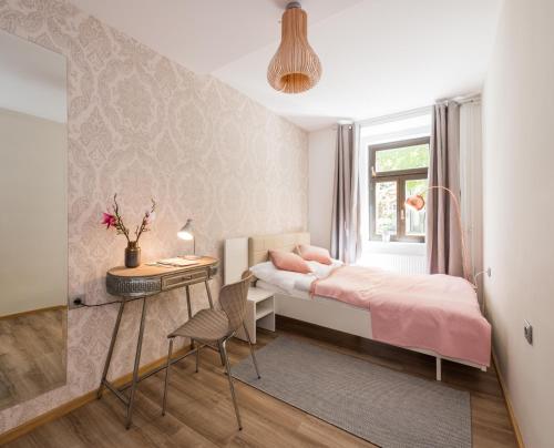 Ένα ή περισσότερα κρεβάτια σε δωμάτιο στο Royal Vega Apartment
