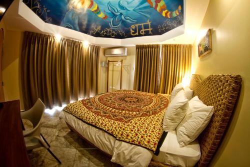 a bedroom with a bed in a room with curtains at Dharma Beach in Montañita