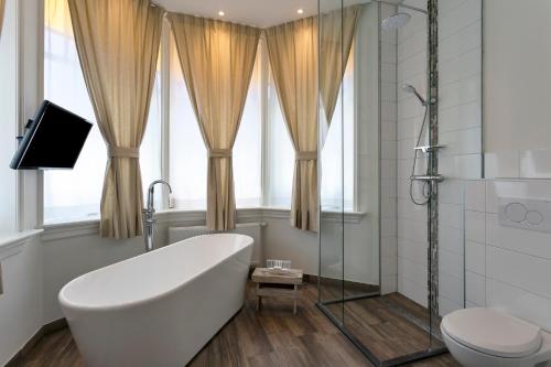 Koupelna v ubytování Hotel Heere