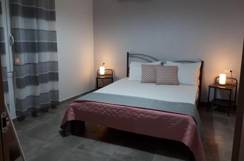 Posteľ alebo postele v izbe v ubytovaní Sofis House