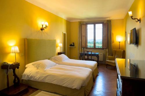 Katil atau katil-katil dalam bilik di Palazzo Ravizza