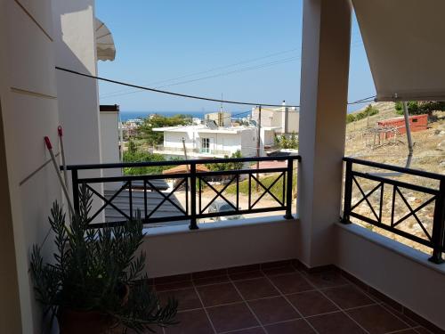 a balcony with a view of the ocean at Christi Apartments Α&Β in Kokkíni Khánion