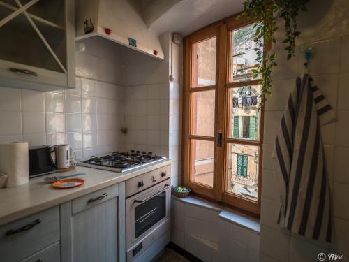 Kuchyň nebo kuchyňský kout v ubytování La Casa di Eio
