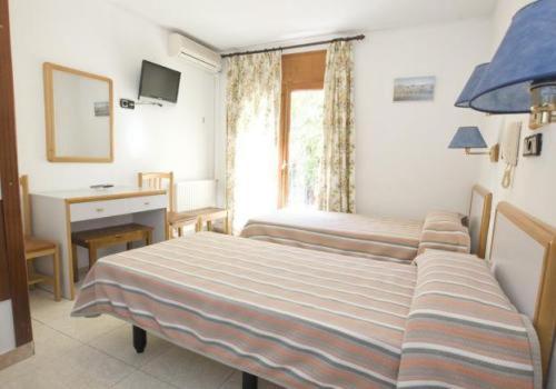 Ein Bett oder Betten in einem Zimmer der Unterkunft Lizana 2