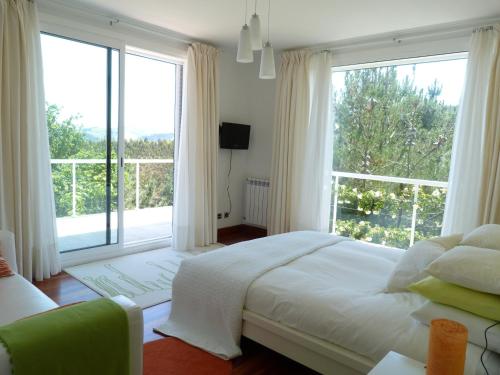 Postel nebo postele na pokoji v ubytování Hotel Garazar
