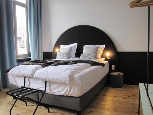 Postel nebo postele na pokoji v ubytování B&B La Corderie