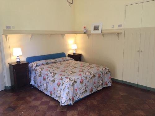 Łóżko lub łóżka w pokoju w obiekcie Villa Malacari