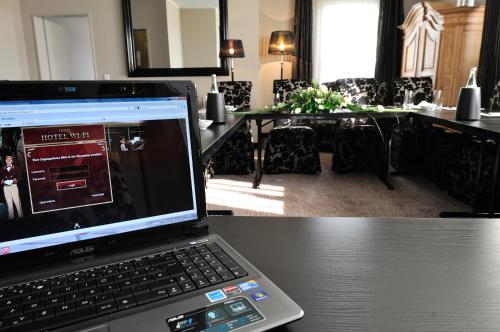 a laptop computer sitting on top of a table at Stage47 in Düsseldorf