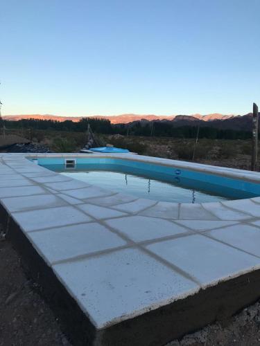 a swimming pool on top of a roof at Cabañas Sehuen in Uspallata