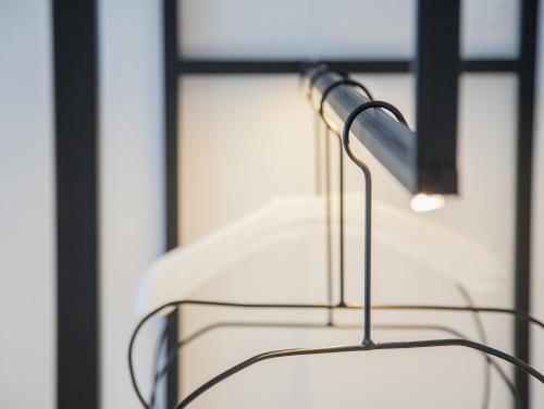 a towel rack in front of a window at The Place Taichung in Taichung