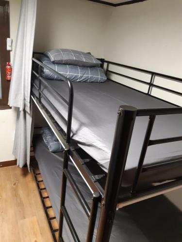 a couple of bunk beds in a room at Able Guesthouse Hongdae 2 in Seoul