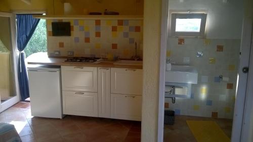 Appartamento a Feraxi tesisinde mutfak veya mini mutfak