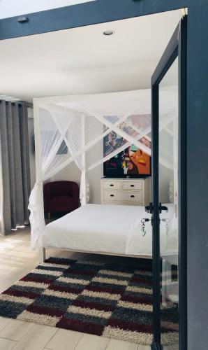 Postel nebo postele na pokoji v ubytování PAP'S Chambres d'Hôtes