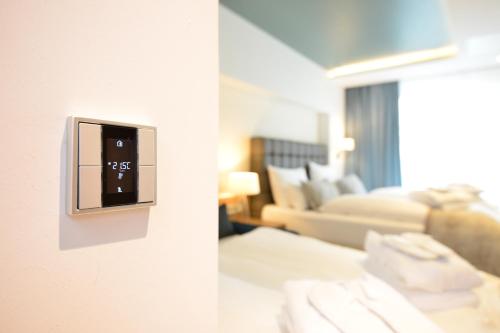 Ένα ή περισσότερα κρεβάτια σε δωμάτιο στο Parkhotel Residenz