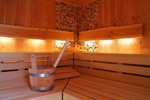 a inside of a sauna with a trash can in it at Landgasthof Adler Pelzmühle in Biederbach Baden-Württemberg