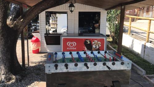 a game of abacus in front of a house at Residence Punta Cilento in Pisciotta
