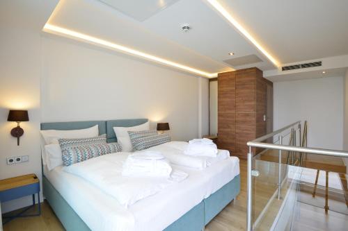 Ένα ή περισσότερα κρεβάτια σε δωμάτιο στο Parkhotel Residenz