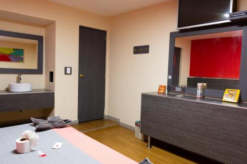 Кровать или кровати в номере Hotel H - Piet Adults Only