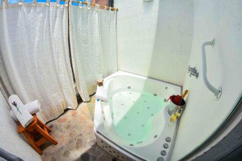 Ένα μπάνιο στο Hotel Spa Terrazas del Uritorco