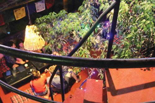 a group of people in a indoor garden at Rest Up Kathmandu Hostel in Kathmandu