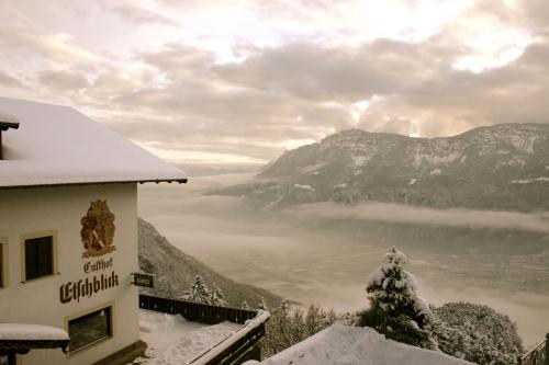 a view of a valley covered in snow at Panoramapension Etschblick in Meltina
