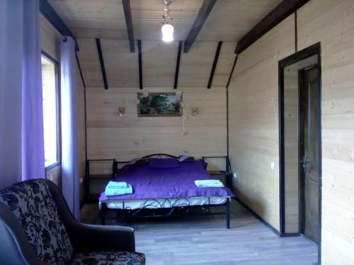 En eller flere senge i et værelse på Rosinka