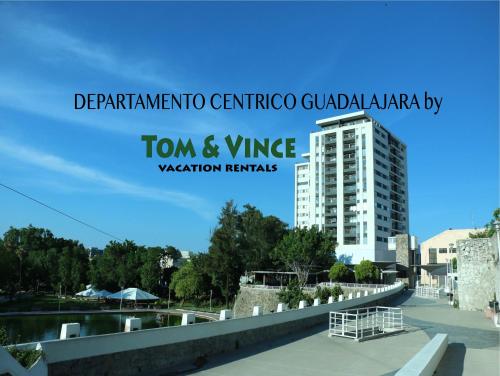 a view of a building from a bridge at Departamento Centrico Guadalajara in Guadalajara