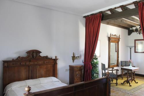 Un pat sau paturi într-o cameră la Vettonia