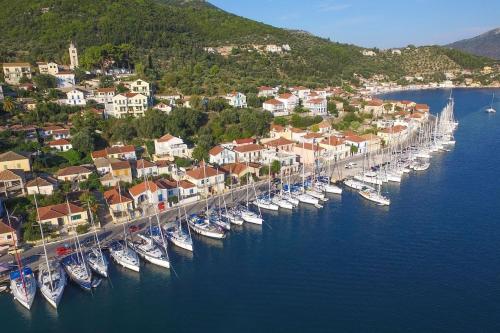 an aerial view of a harbor with boats in the water at Cavos Seaside House in Vathi, Ithaka