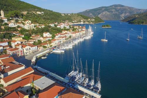 an aerial view of a harbor with boats in the water at Cavos Seaside House in Vathi, Ithaka