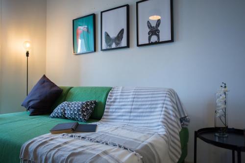 Кровать или кровати в номере Yippee! Apartments I Town Center