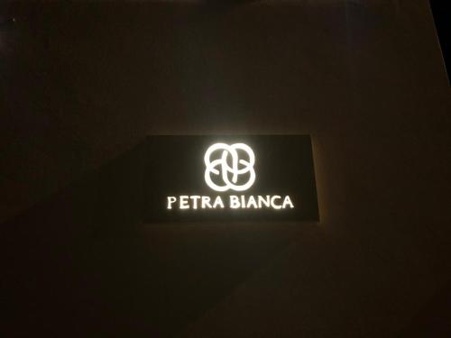 a sign that says pti bungota on a wall at Petra Bianca in Torre San Giovanni Ugento