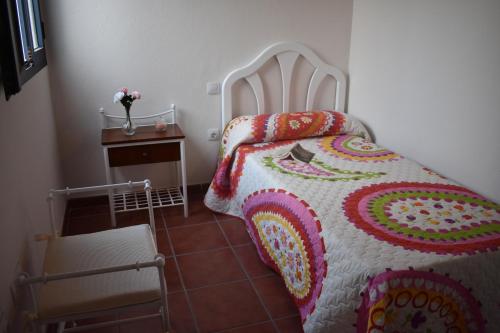 En eller flere senge i et værelse på Ático estación