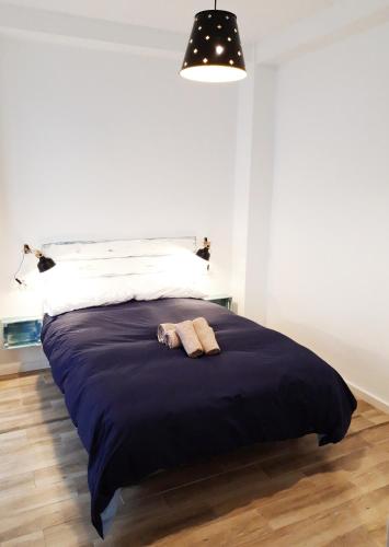 Posteľ alebo postele v izbe v ubytovaní Acogedor Apartamento Centro Benalmadena