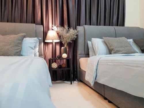 Postel nebo postele na pokoji v ubytování Puchong Setiawalk 8-12 pax 5min LRT Cozy Apartment