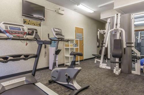 a gym with cardio equipment and a treadmill at Comfort Inn & Suites in Medicine Hat