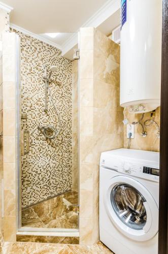 Ένα μπάνιο στο ARTAL Apartment on Obolonsky avenue 16a