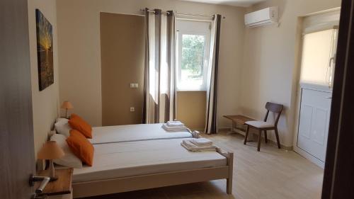 Loggos view apartmentsにあるベッド