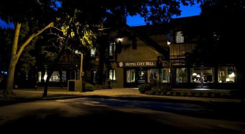 a building with a sign that reads bend city hall at Hotel City Bell in La Plata