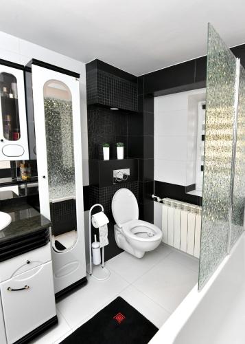 Ένα μπάνιο στο Apartament Spytkowice - ENERGYLANDIA KRAKÓW OŚWIĘCIM WADOWICE