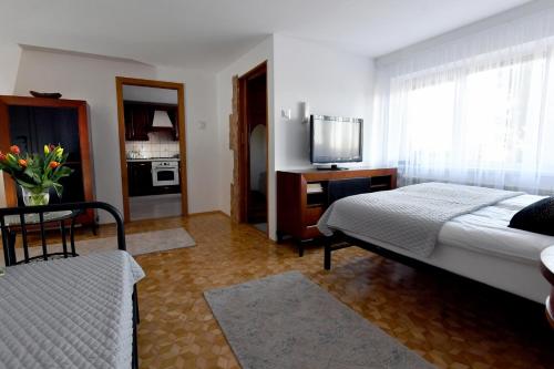 Ένα ή περισσότερα κρεβάτια σε δωμάτιο στο Apartament Spytkowice - ENERGYLANDIA KRAKÓW OŚWIĘCIM WADOWICE