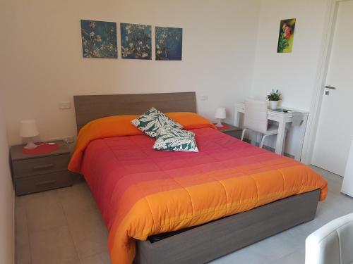 
A bed or beds in a room at Il Poggio Stellato
