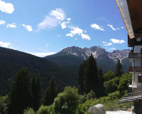 a view of the mountains from a building at La Suite in Candide