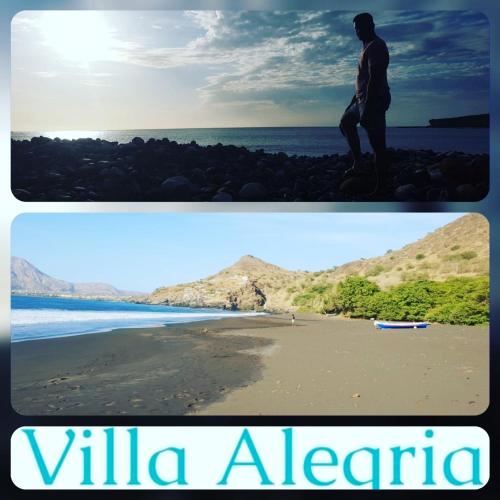 a man standing on a beach next to the ocean at B&B "Villa Alegria", Tarrafal in Tarrafal