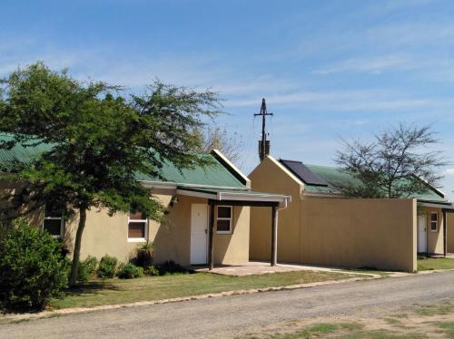 a church with a cross on top of it at Wild Clover Cottages in Stellenbosch