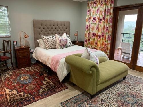 Uma cama ou camas num quarto em Cavalo Guesthouse & Equestrian Estate